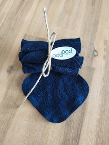 Odd Pod Reusable Baby Wipes in blue and white cotton towelling, rolled up in pack of eight.
