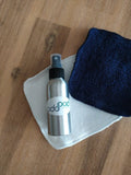 Odd Pod Reusable Baby Wipes in cotton towelling, showing the blue and white option, featured with a Aluminium Spray bottle that is often used with the reusable wipes.