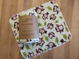 Odd Pod PP Paper in flannel fabric, shown with one wipe open, and a mint green owl design in a pack of 8 reusable wipes.