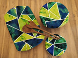 Odd Pod dish and bowl covers, that replaces single use cling wrap options while adding that extra style to your table setting. The dish covers featured are in lovely vibrant green and blue prim shapes.