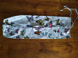 Odd Pod Yoga Mat Bag in butterfly design, made from 100% cotton, with a functional handle and cotton drawstring. Pocket in front with wooden button closure for extra convenience.