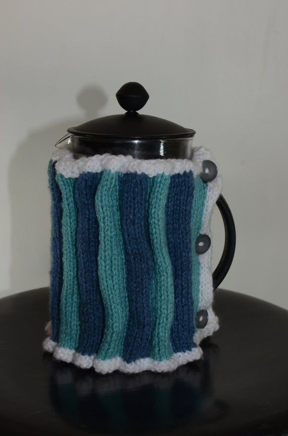 Hand knit coffee plunger warmer in denim blue, duck egg and white colours