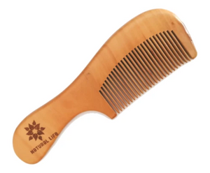A natural comb that is made from sustainably sourced FSC approved Pear wood